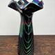 Vintage iridescent glass vase with ribbed design and ruffled neck, H 21 cm.