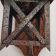Wall lamp in wrought iron and old wood