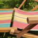 Chilienne transat chaise longue pour enfant vintage, toile rayures 1960-1970.