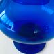 Blue glass apothecary shaped bottle
