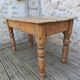 Small antique farmhouse table in solid pine.