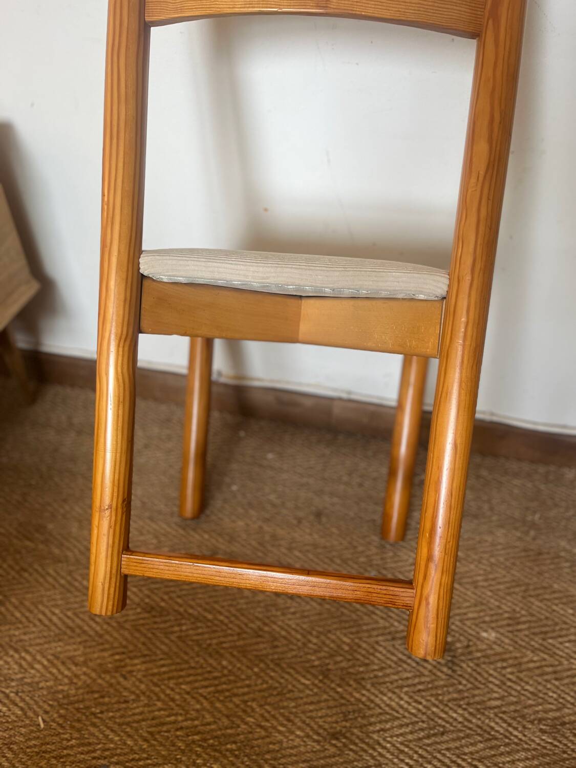 Vintage wooden chair with cream white corduroy seat