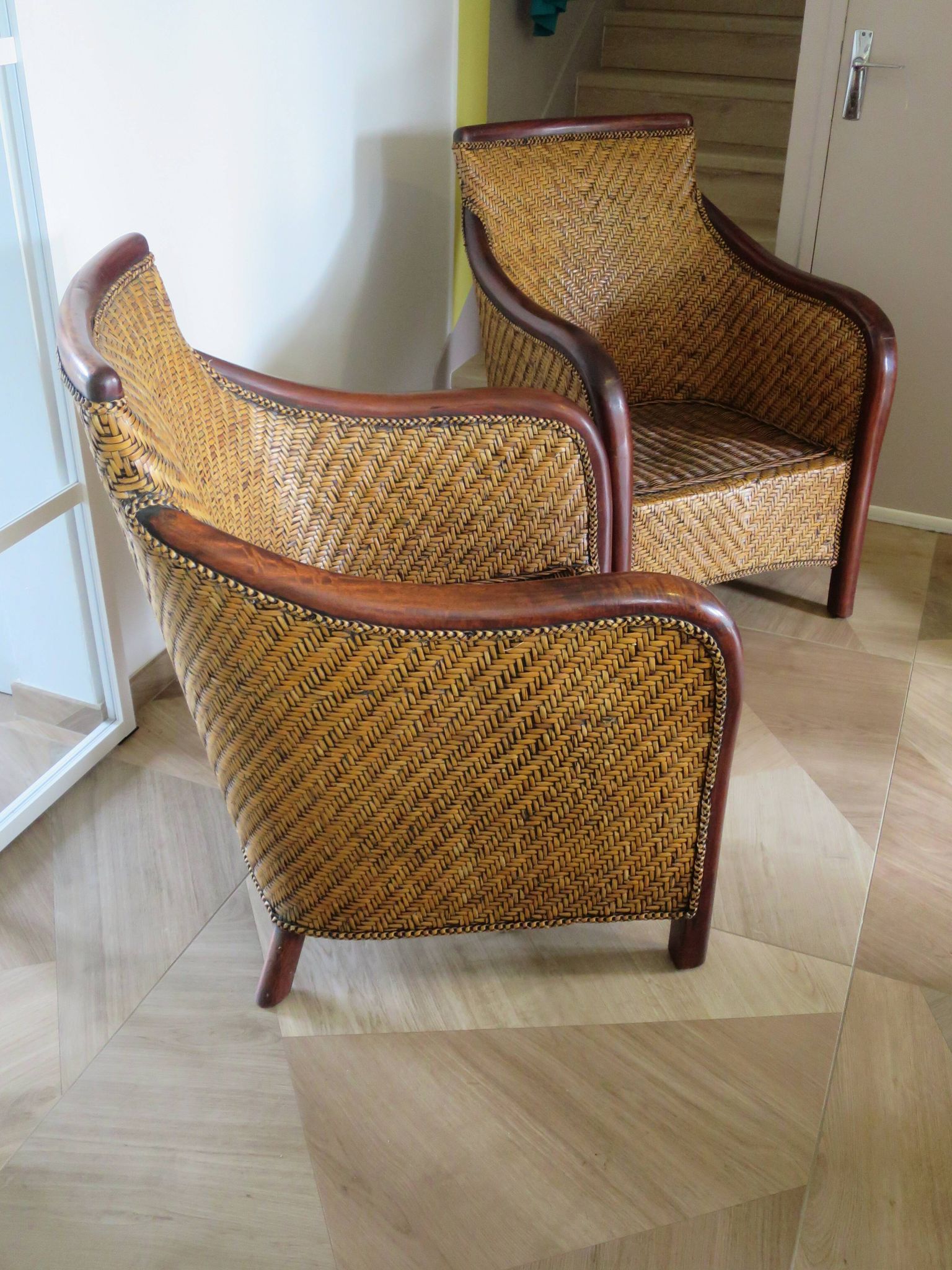 Set of 2 armchairs in woven rattan and exotic wood, 1980s