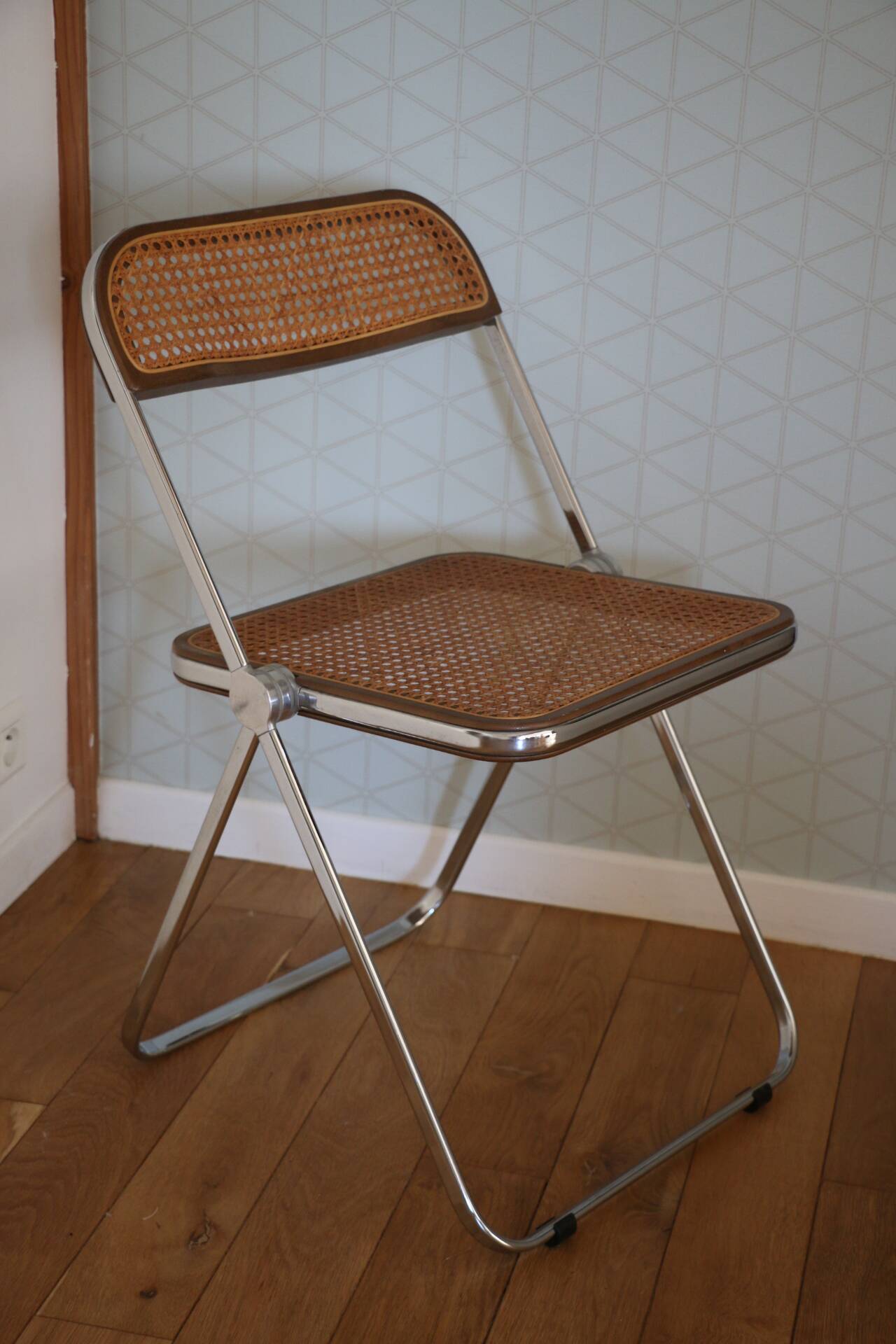 2 plia rattan chairs by piretti