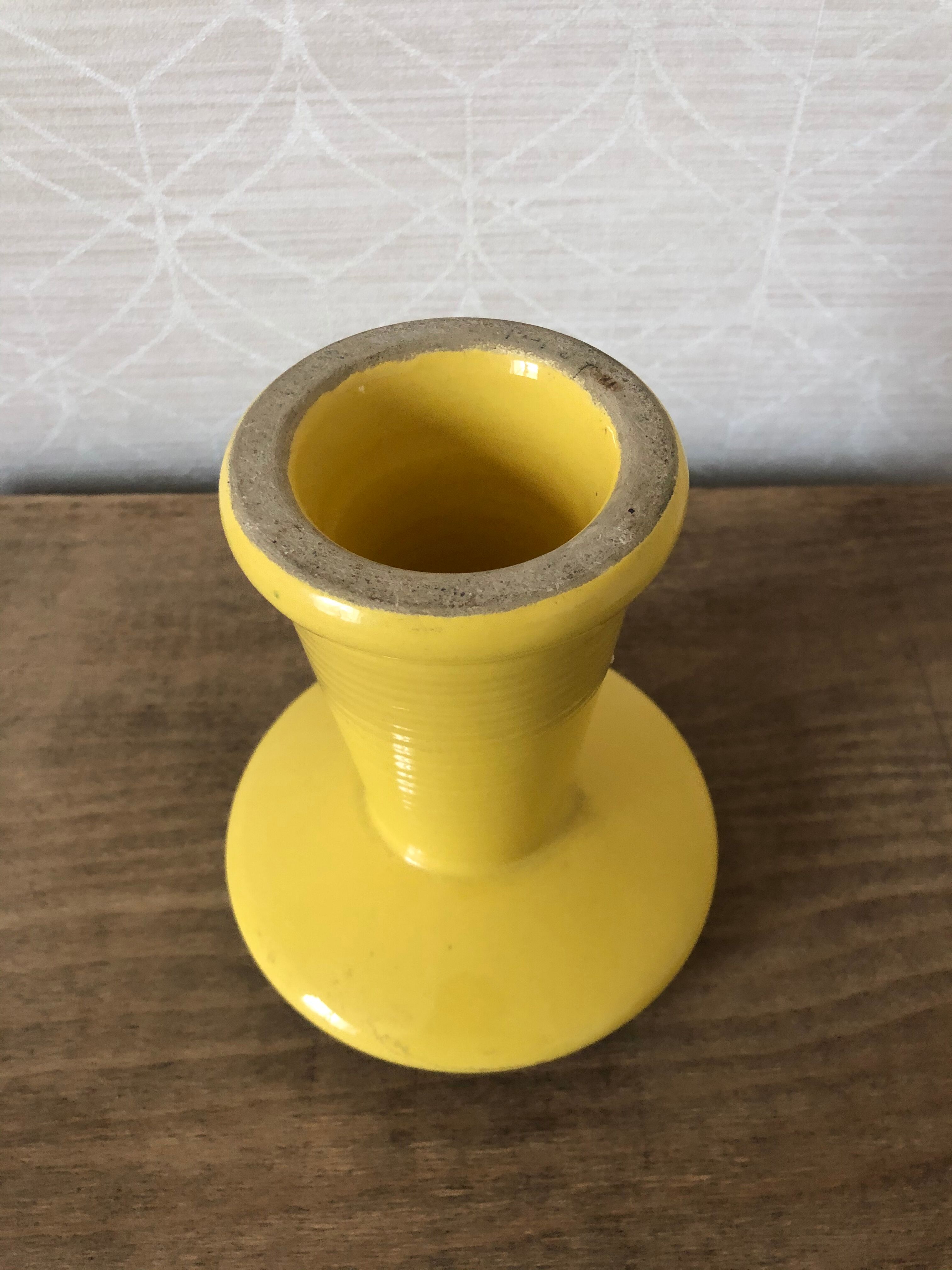 Vintage yellow ceramic candlestick