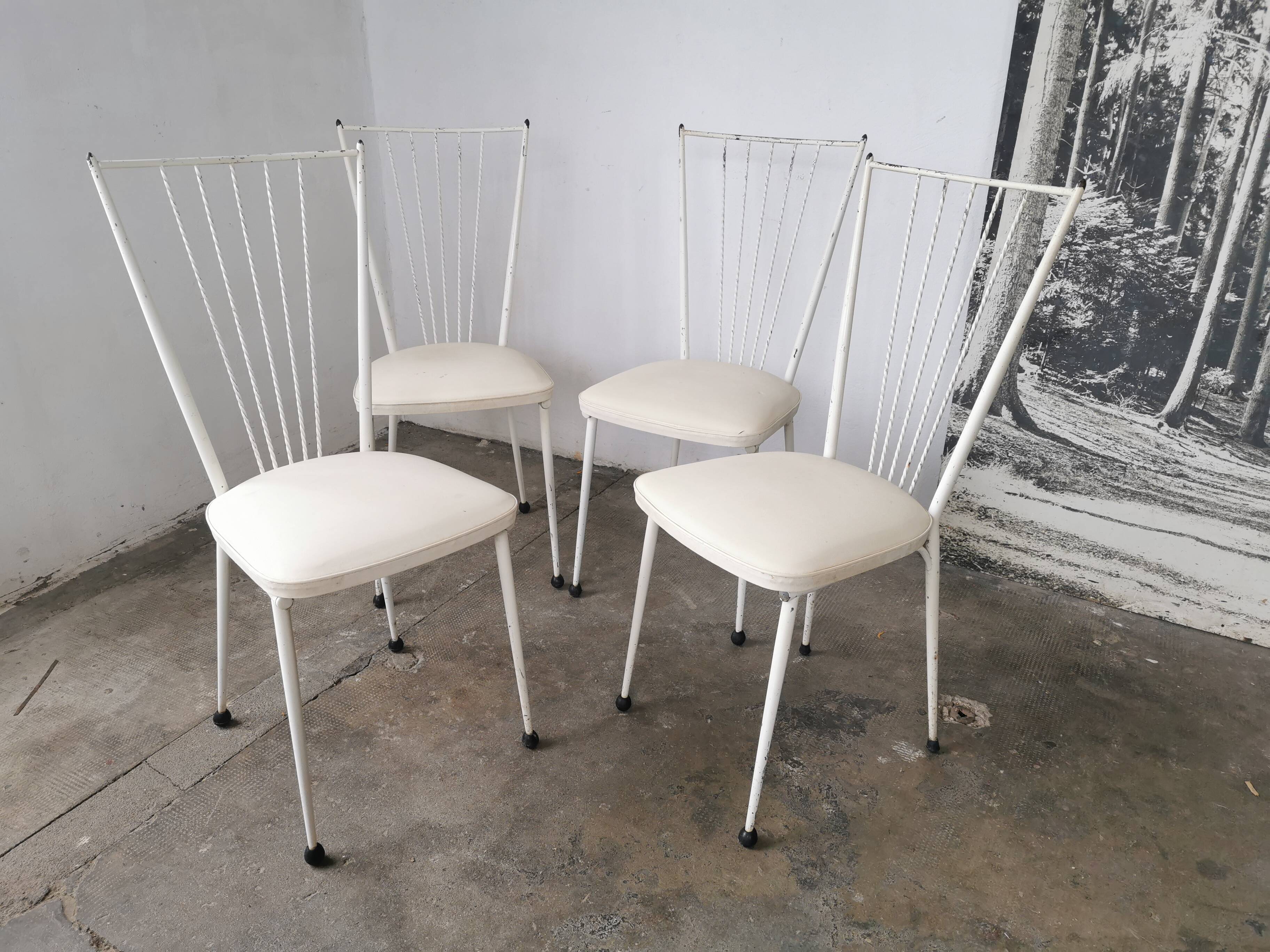 Set of 4 vintage chairs in metal and Skai