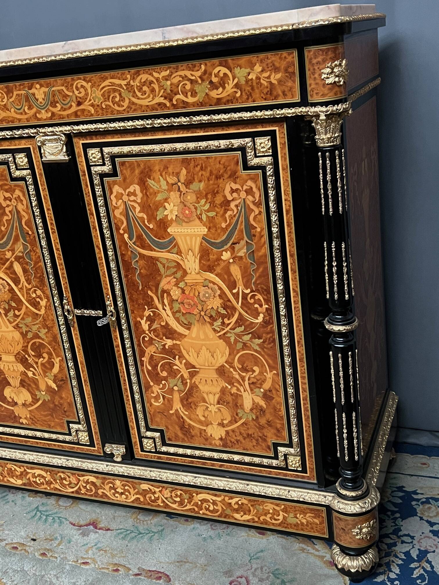 Two-door commode in Louis XVI style with marquetry and marble top.