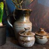 Duo of potter's pots covered in vintage glazed stoneware