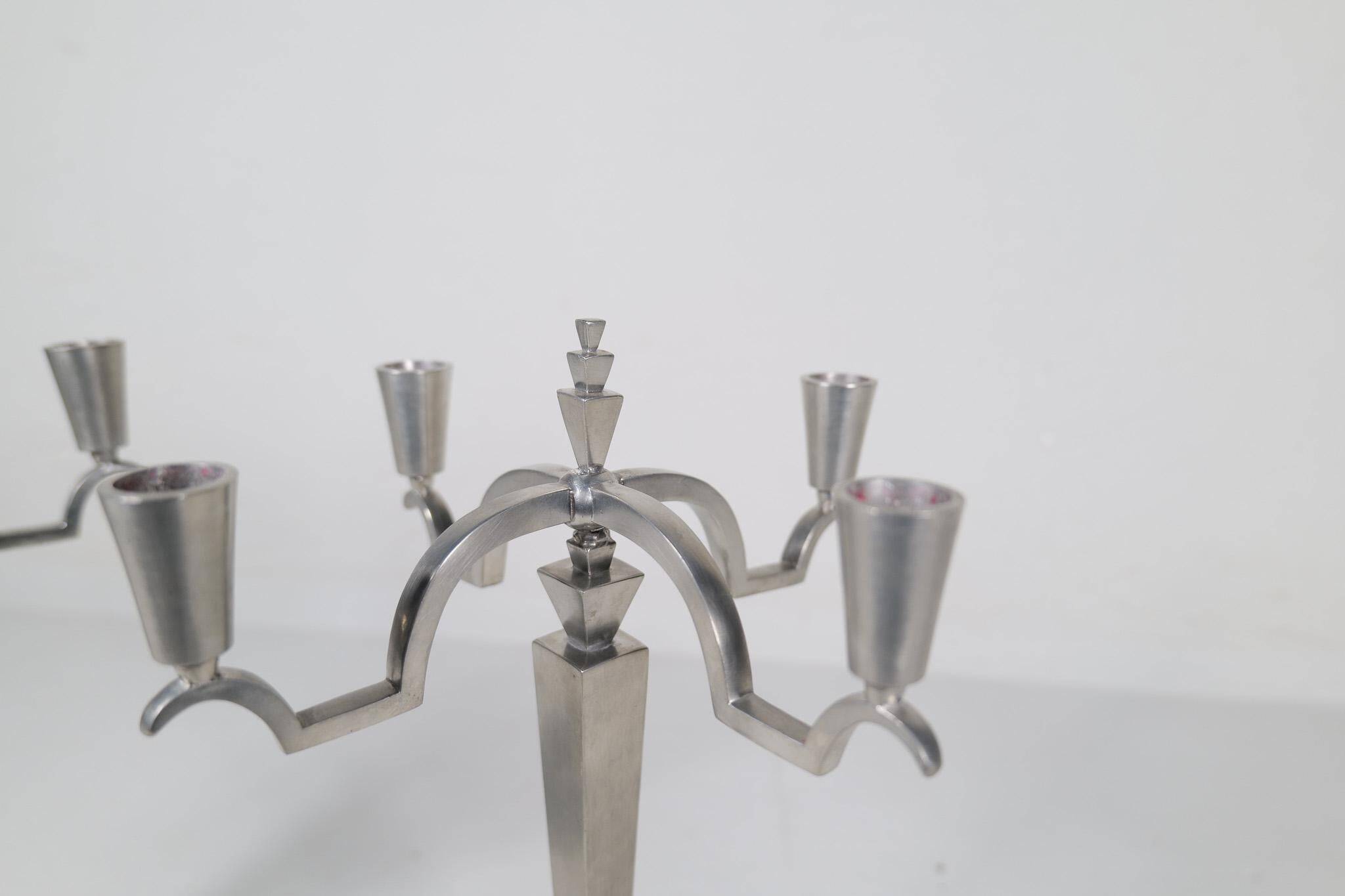 Sculptural Art Deco set of chandeliers in tin, Sweden, 1940s.