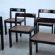 Set of eight black lacquered dining chairs