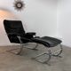 Old armchair and ottoman black leather tubular chrome bauhaus design from the 70s