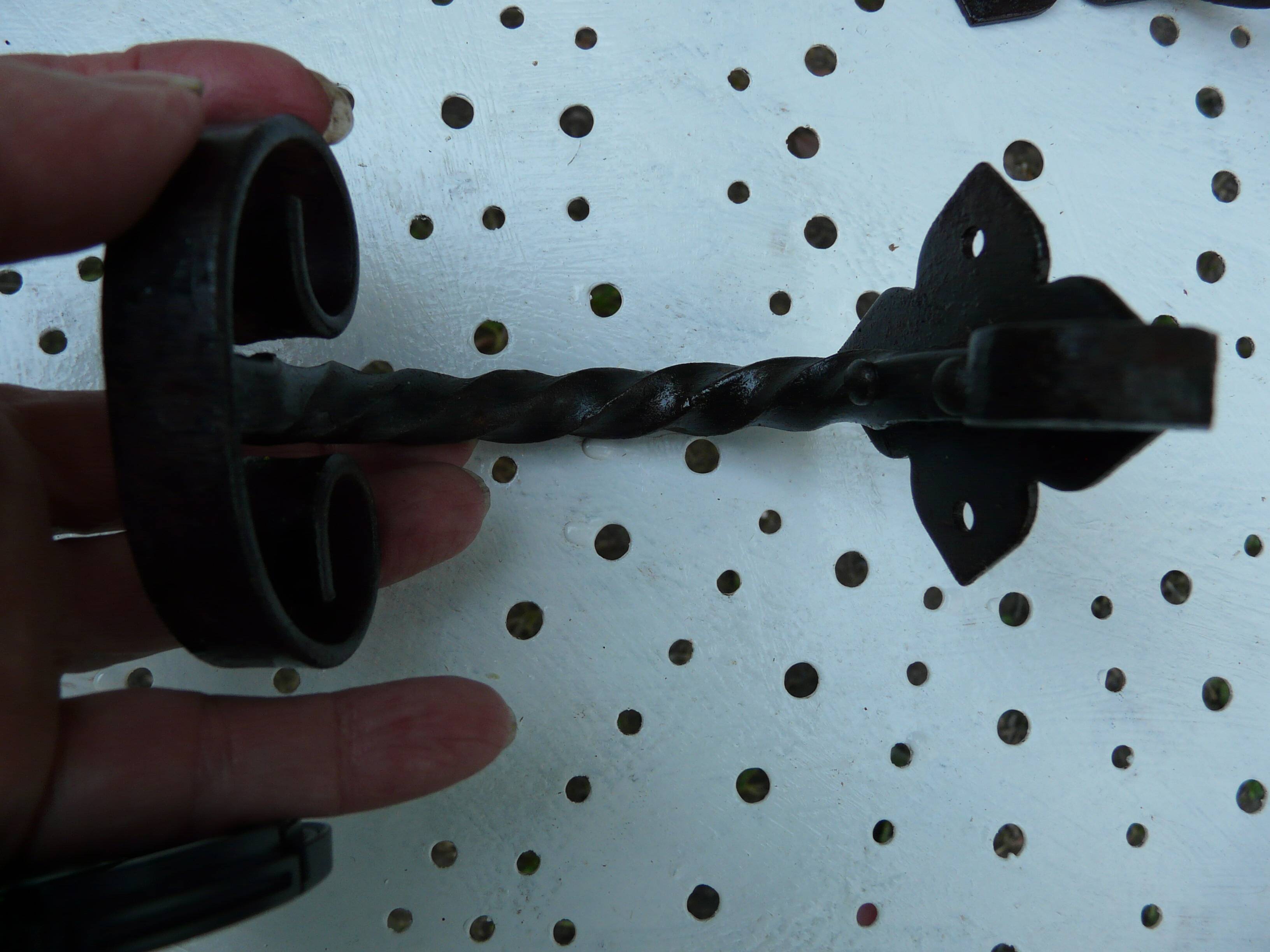 Pair of wrought iron wall hooks