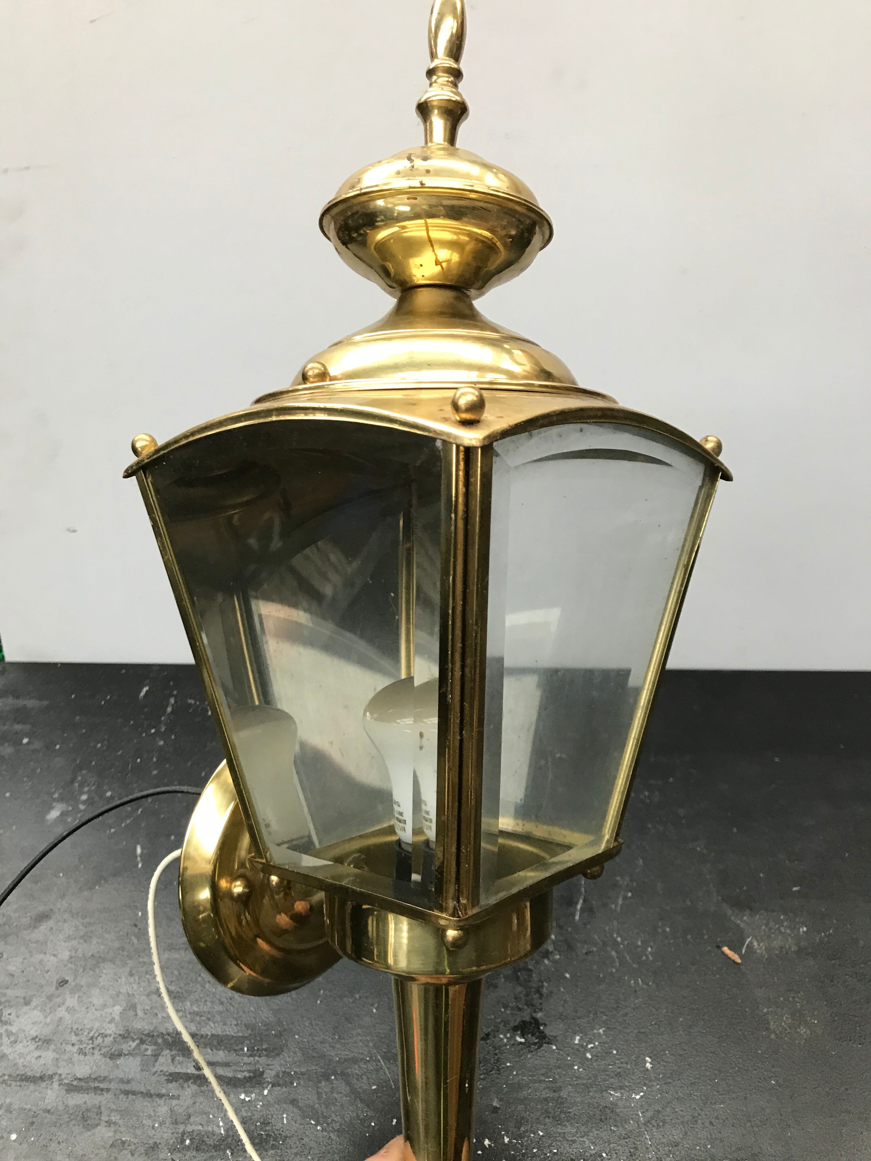 Gold metal lantern wall light with vintage beveled glass