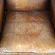 Fauteuil à oreilles particulièrement confortable en cuir de mouton, couleurs époustouflantes