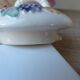Old ceramic teapot in the shape of a basket of fruits from the garden