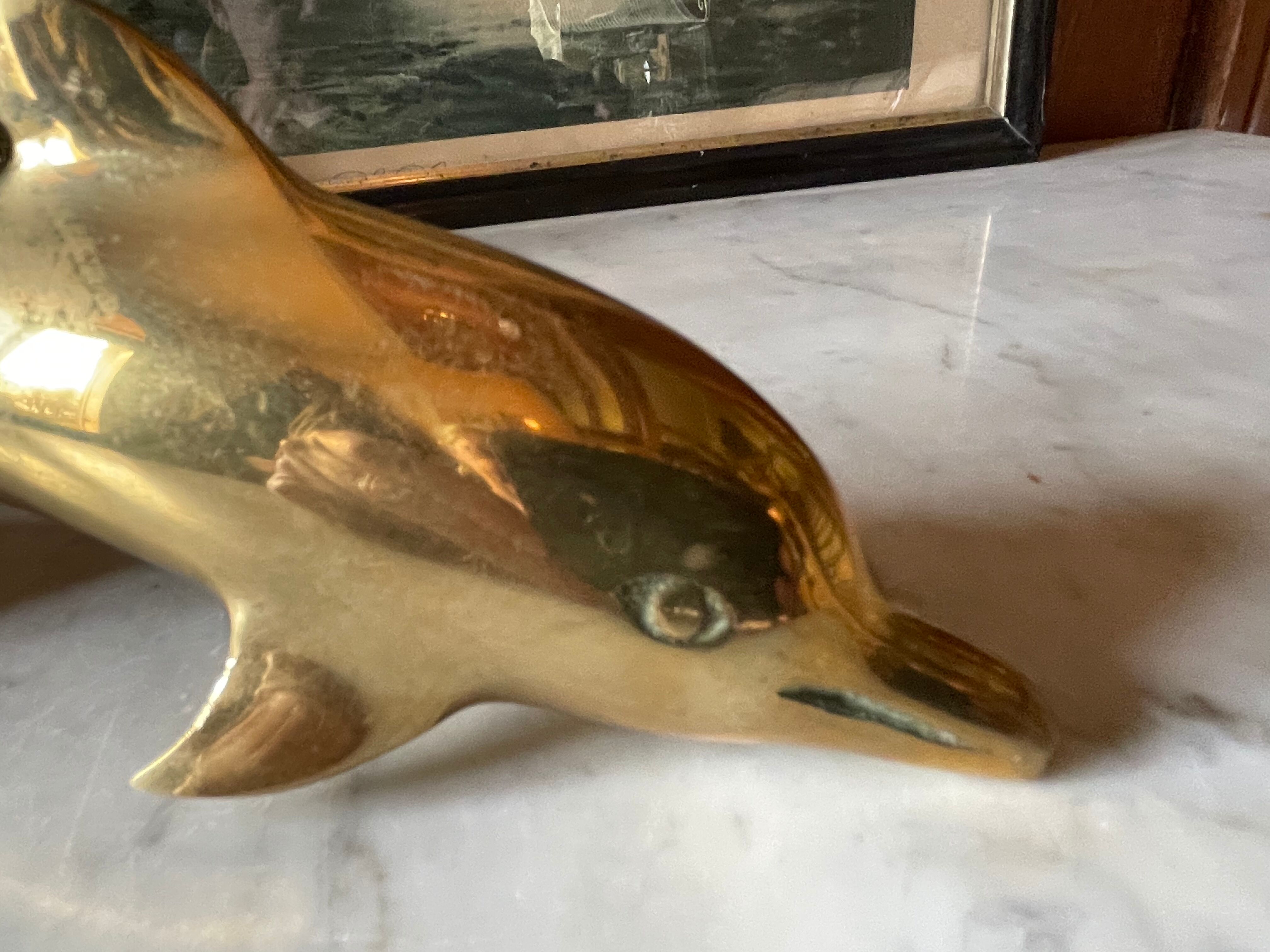 Vintage brass dolphin