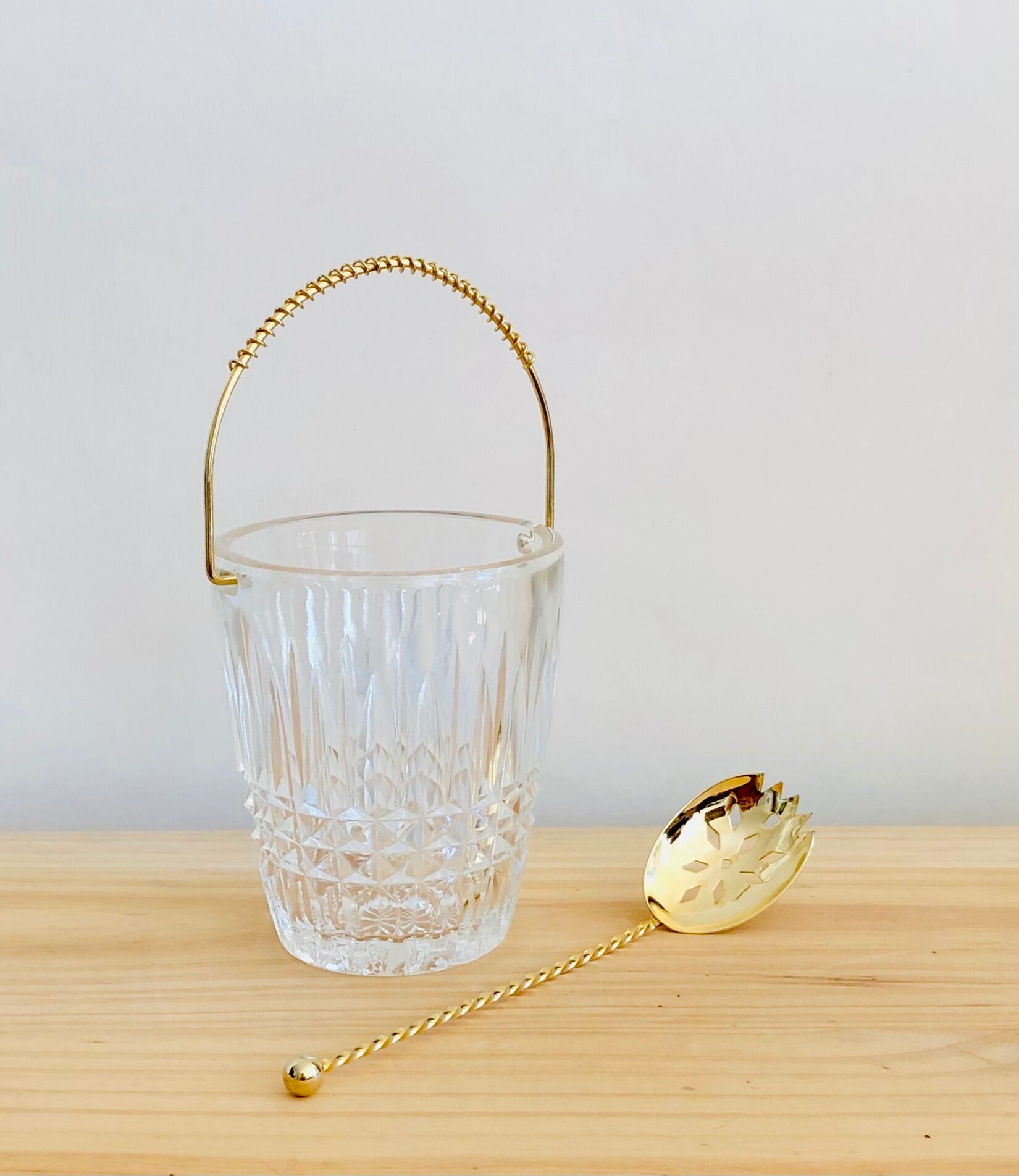 Crystal ice bucket and spoon thereof