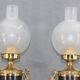 Paire de lampes en bronze doré patiné et verre renflé
