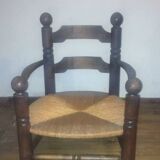 Low oak and straw armchair 1940