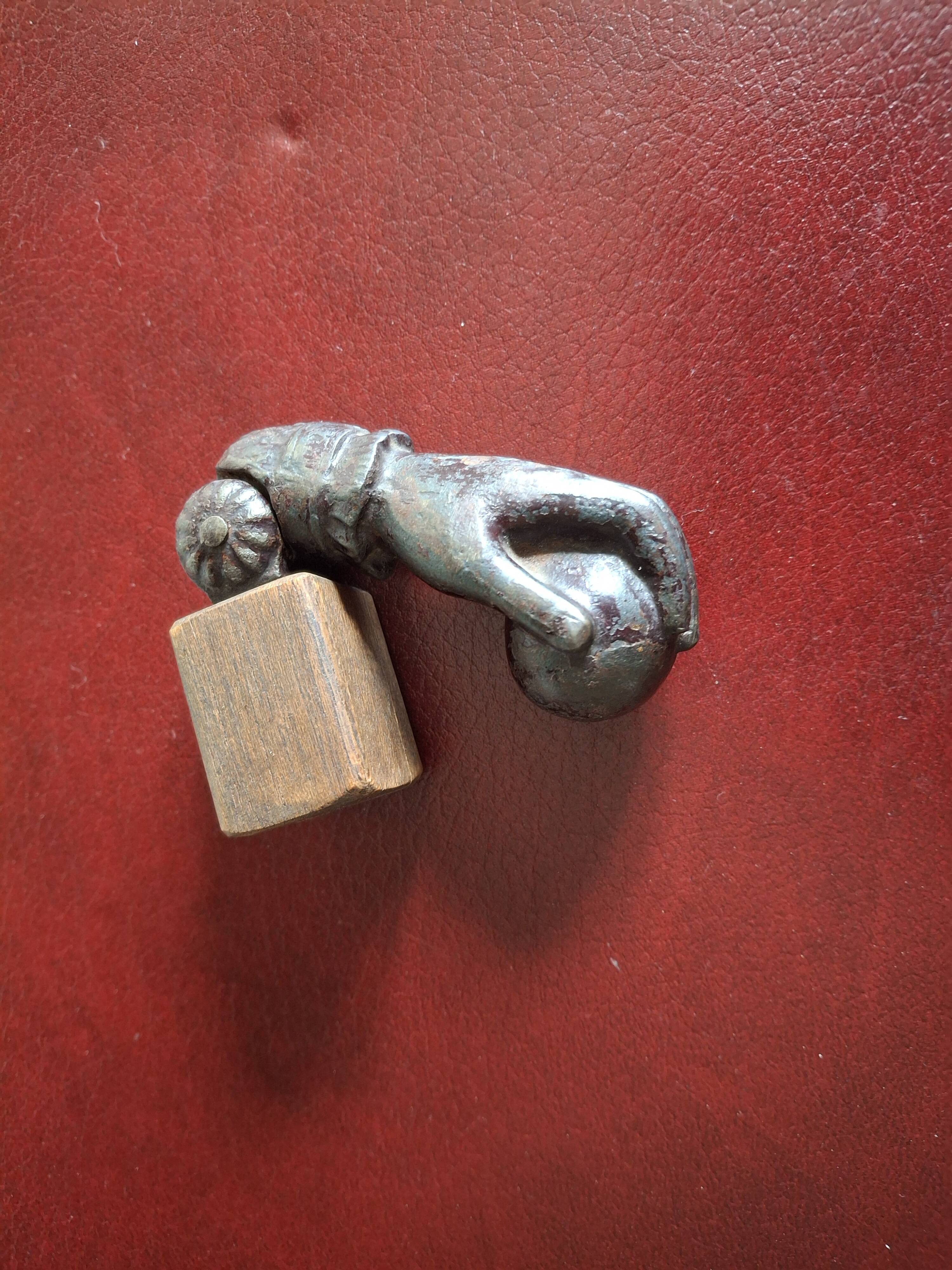 Cast iron door knocker from the 19th century or earlier.