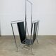 Chrome and black leather magazine rack, 1970s.