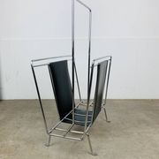 Chrome and black leather magazine rack, 1970s.