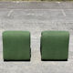 Green armchairs designed by Étienne Fermigier