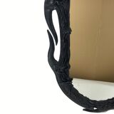Midcentury wavy "Art Nouveau" leather wrapped mirror