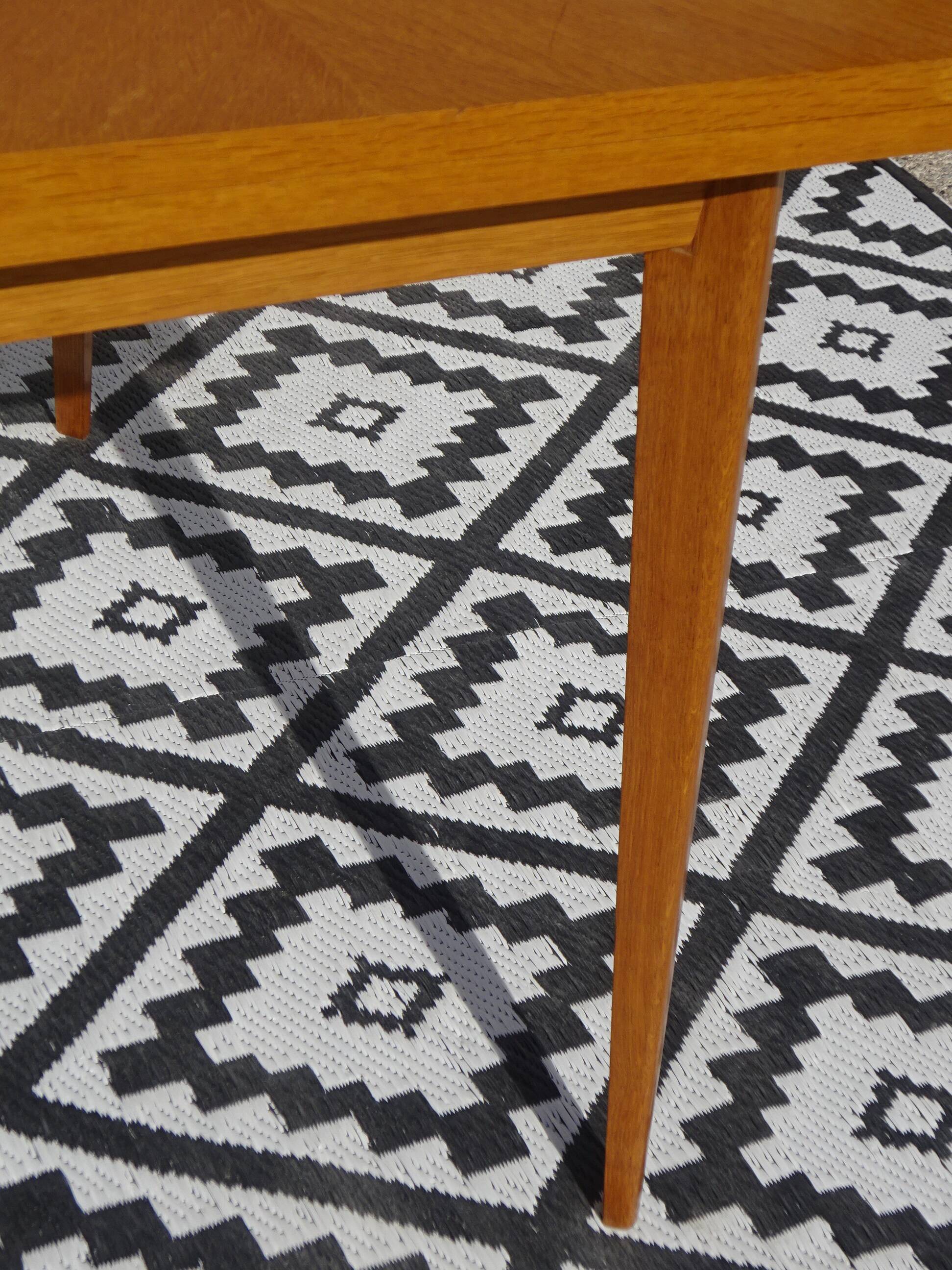 Scandinavian portfolio table model "half-century" by SAM