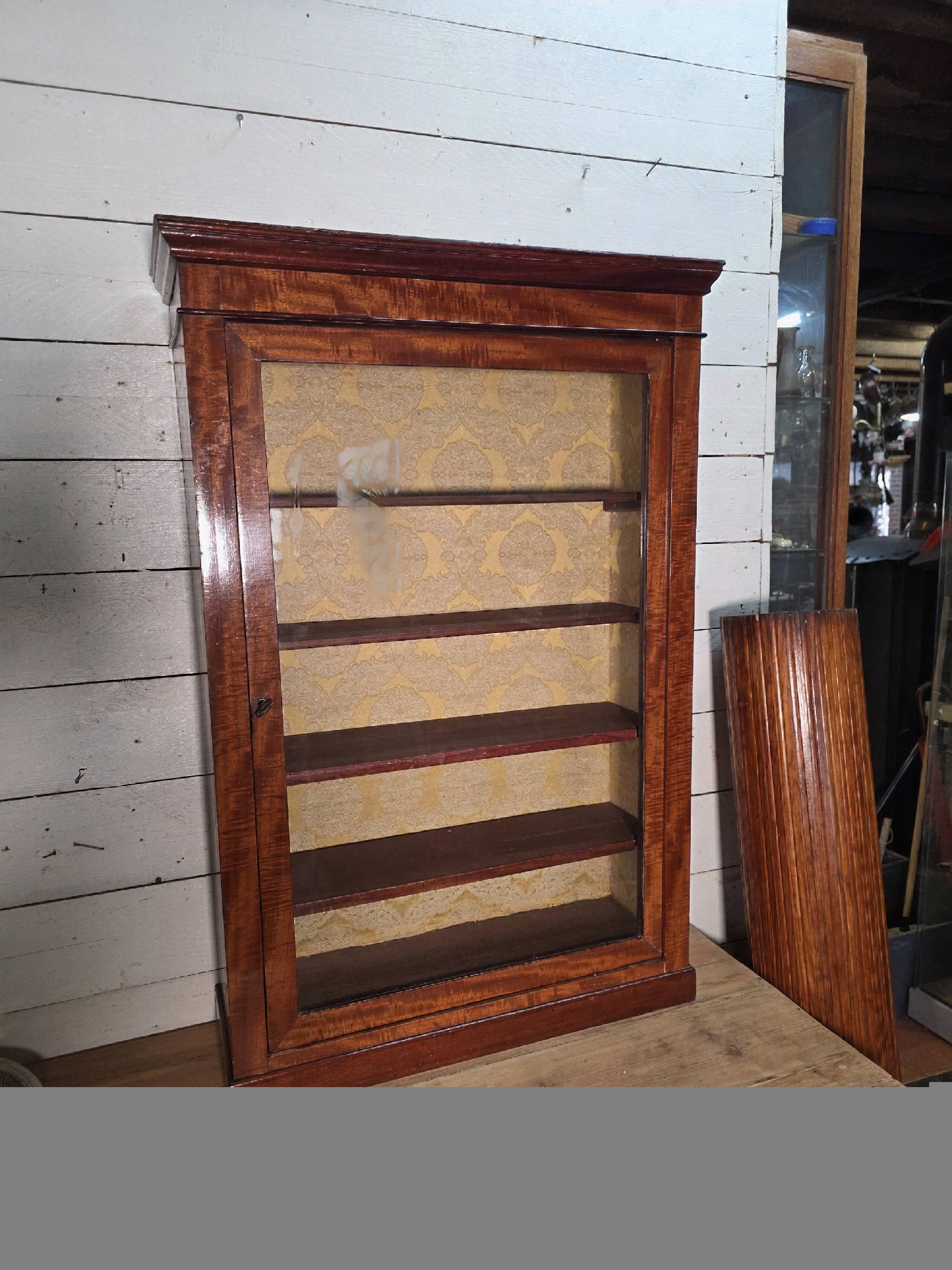 Late 19th century mahogany shop display cabinet.