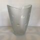 Vase with polka dots, Italy, round with relief.