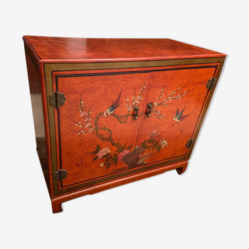 Low sideboard with lacquered decoration with birds on orange background Far East China Japan