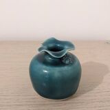 Small handmade turquoise pottery.