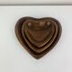 Set of 3 Scandinavian teak empty pockets in heart shape.