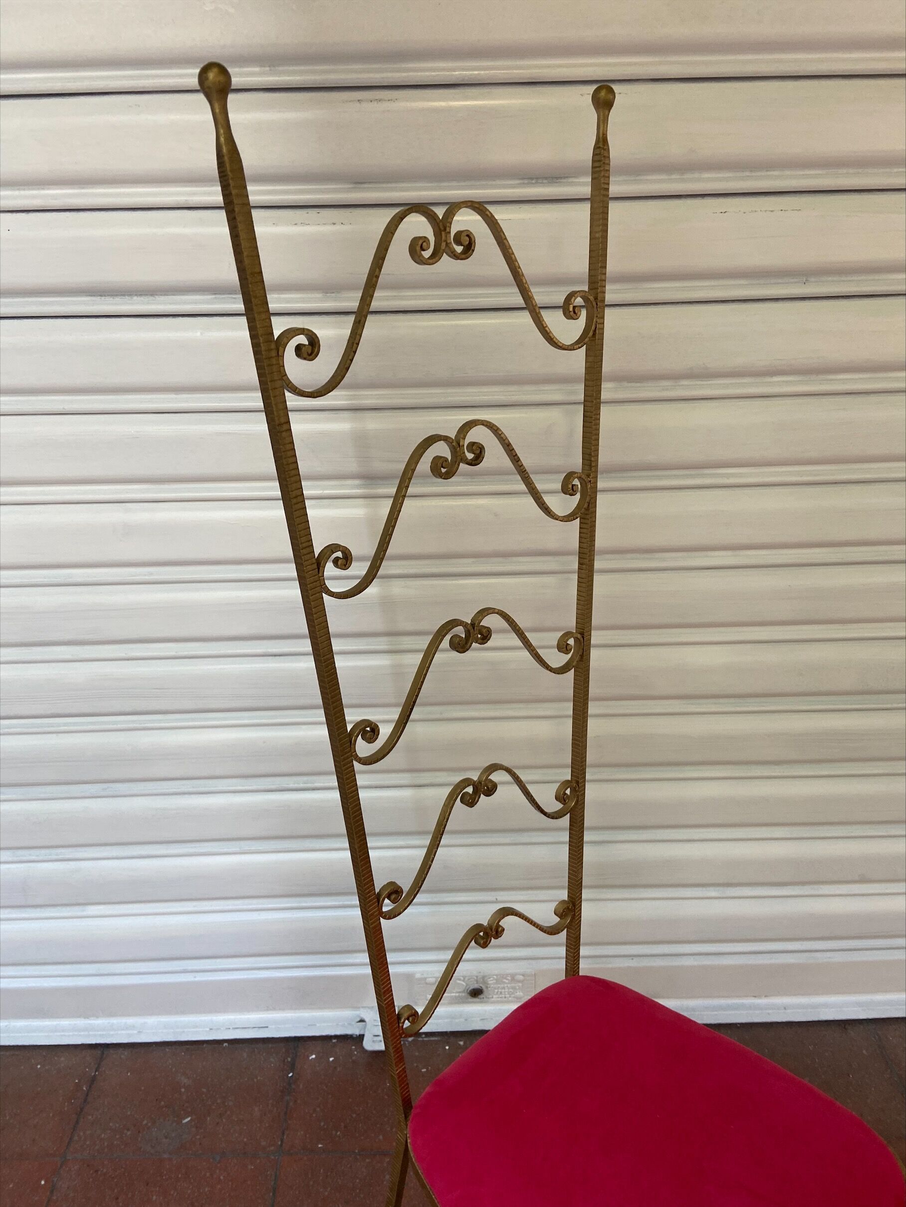 Golden wrought iron chair, Pierre Luigi Colli