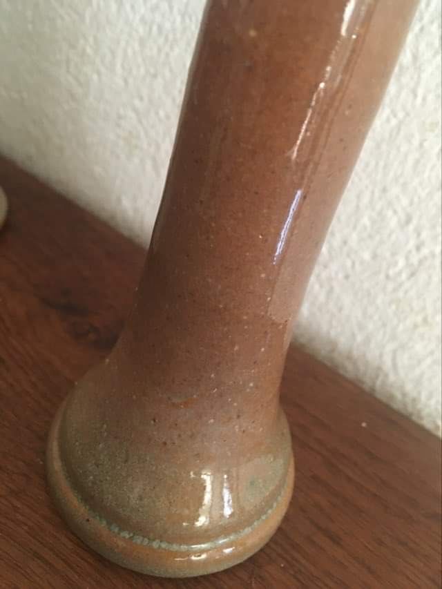 Terracotta candlesticks signed