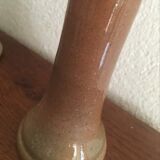 Terracotta candlesticks signed