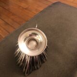 Empty pocket in silver metal