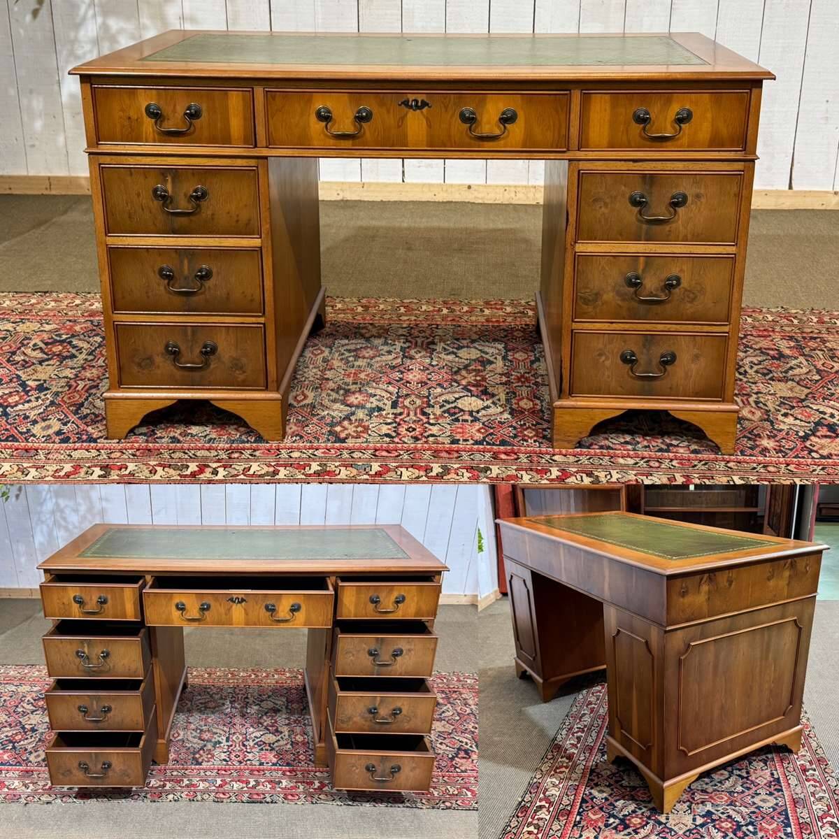 English flat desk with drawers from the 1970s in fir and leather top.