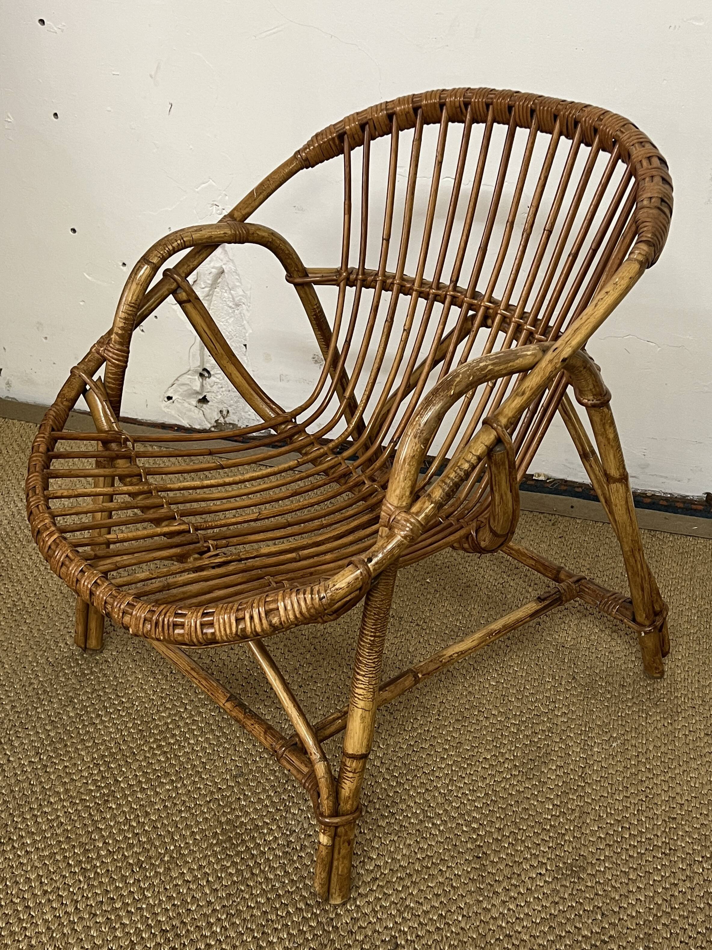 Rattan basket armchair from the 60s and 70s
