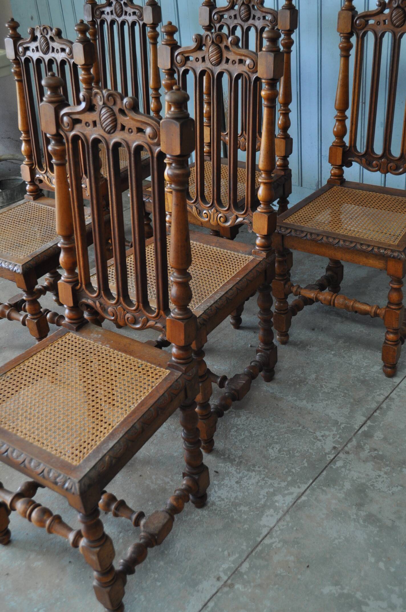Set of 8 tanned chairs.