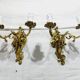 Pair of 2-light bronze wall lights, St. Louis XV