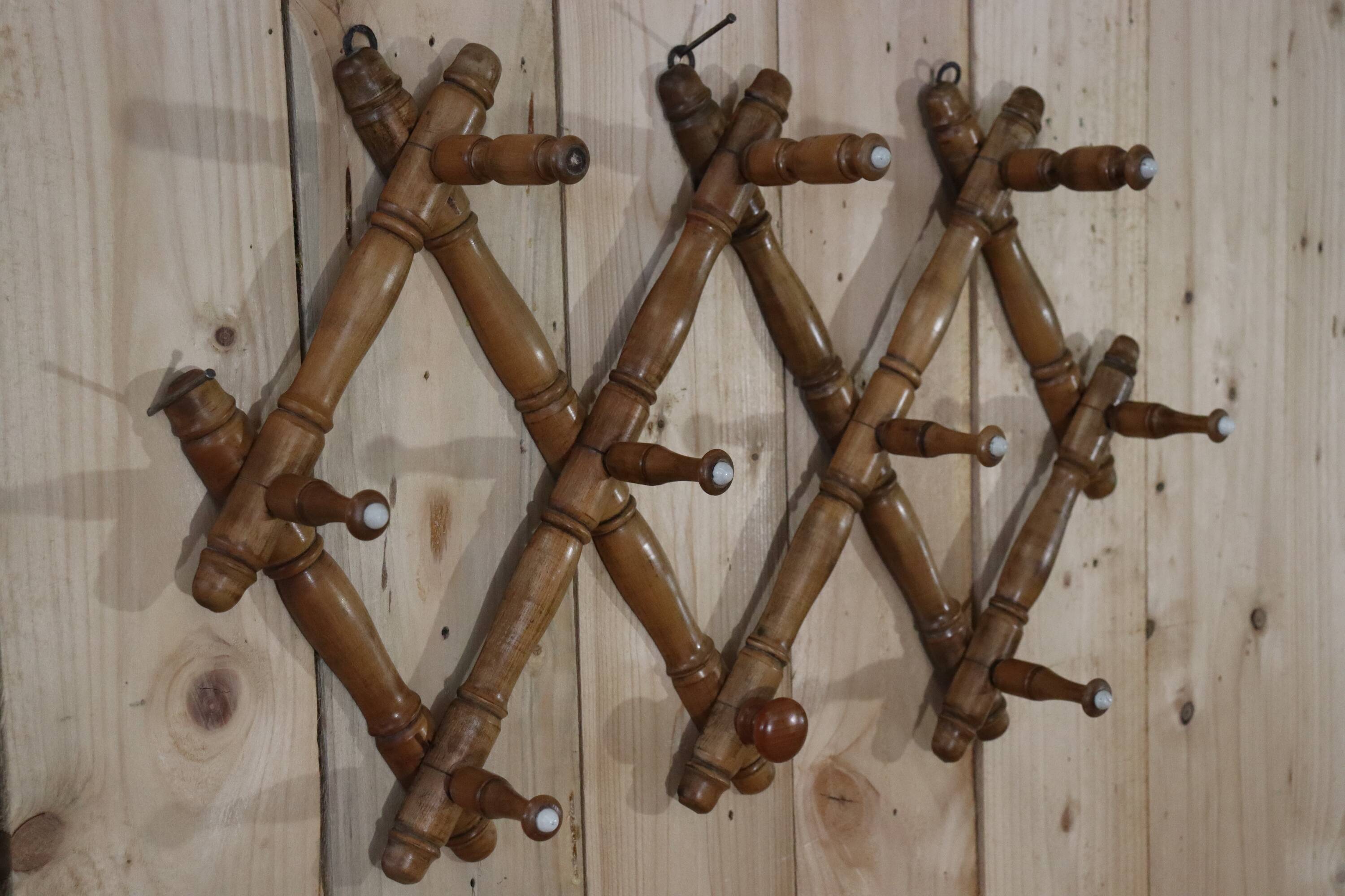 Old turned wooden wall coat rack