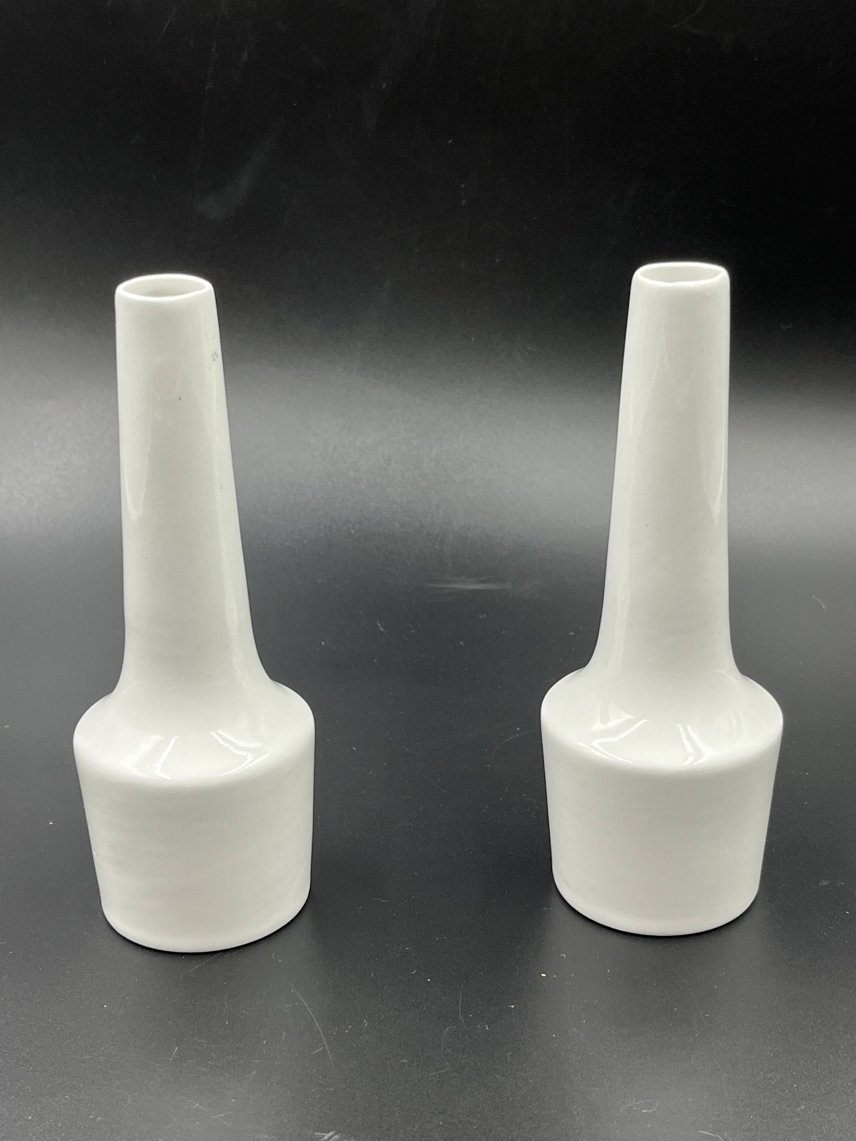 Pair of vintage white ceramic bud vases