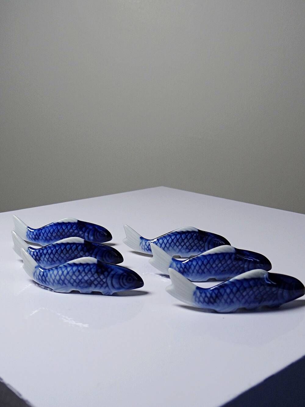 6 porcelain koi carp chopstick/knife rests, China, 1960s-1980s