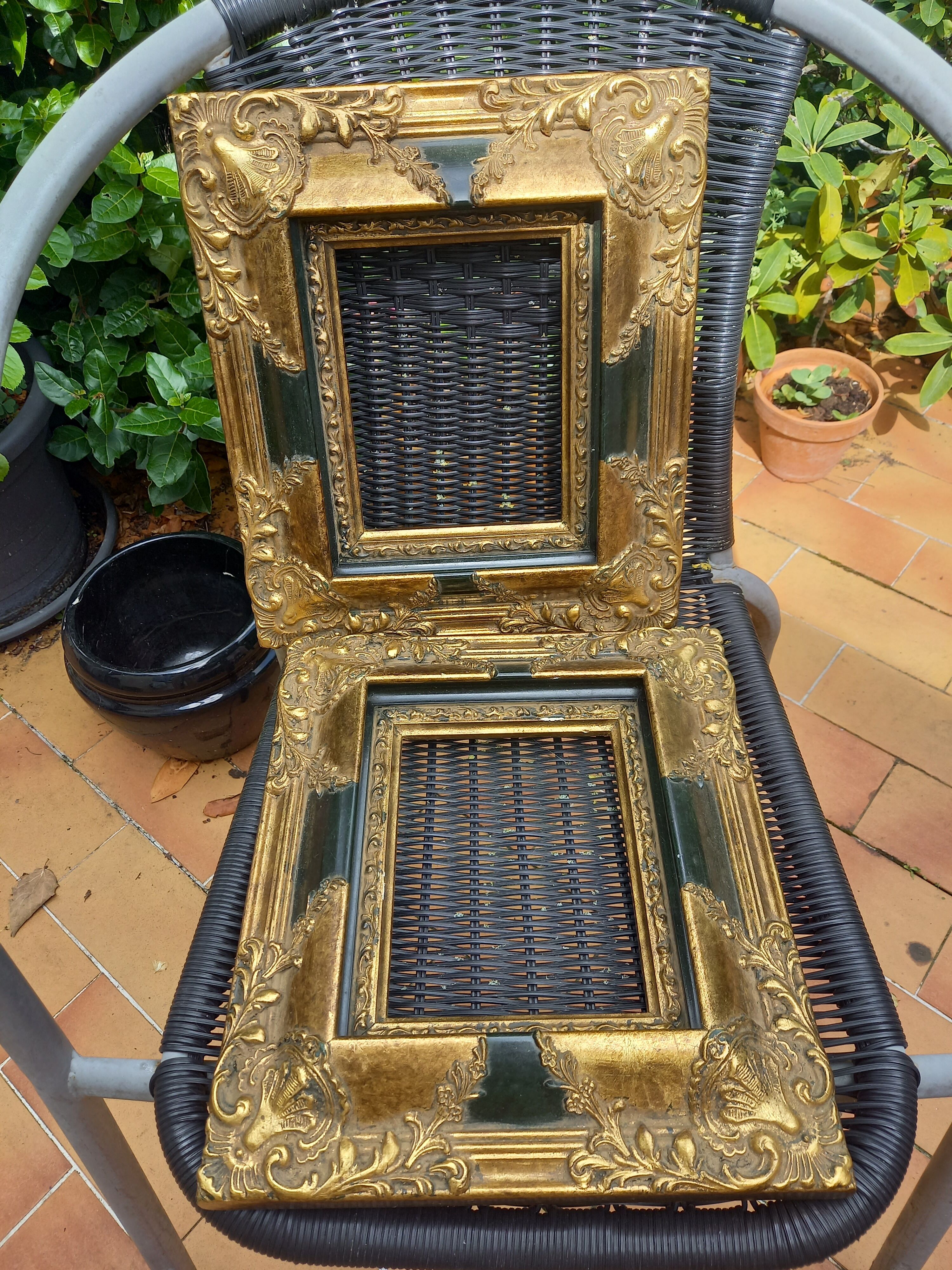 Pair of baroque frames in vintage gilded wood
