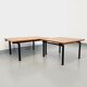 Suite of two vintage modernist Isa coffee tables in teak and black metal from the 60s