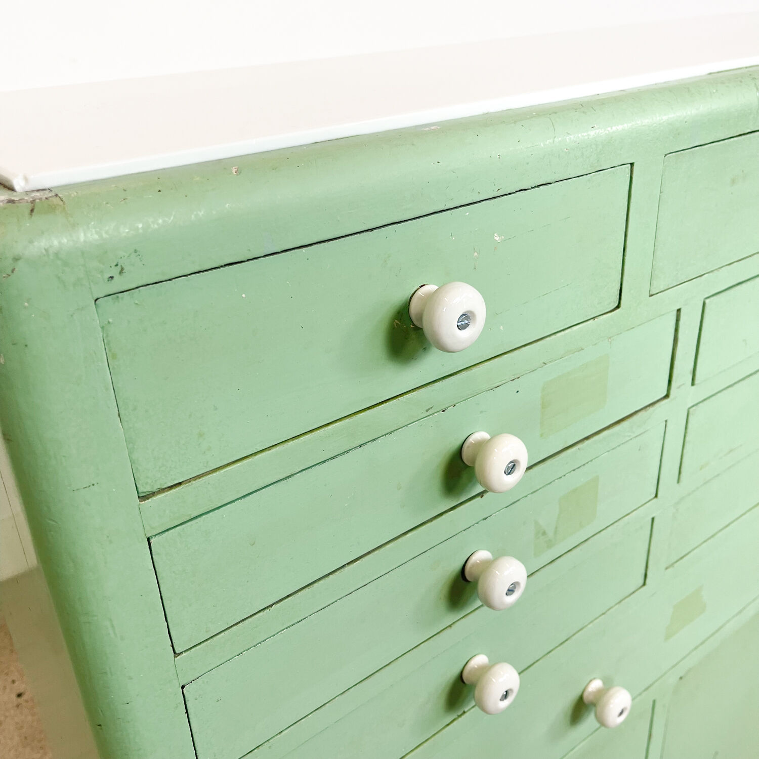 Vintage mint green dentist drawer unit with opaline glass top