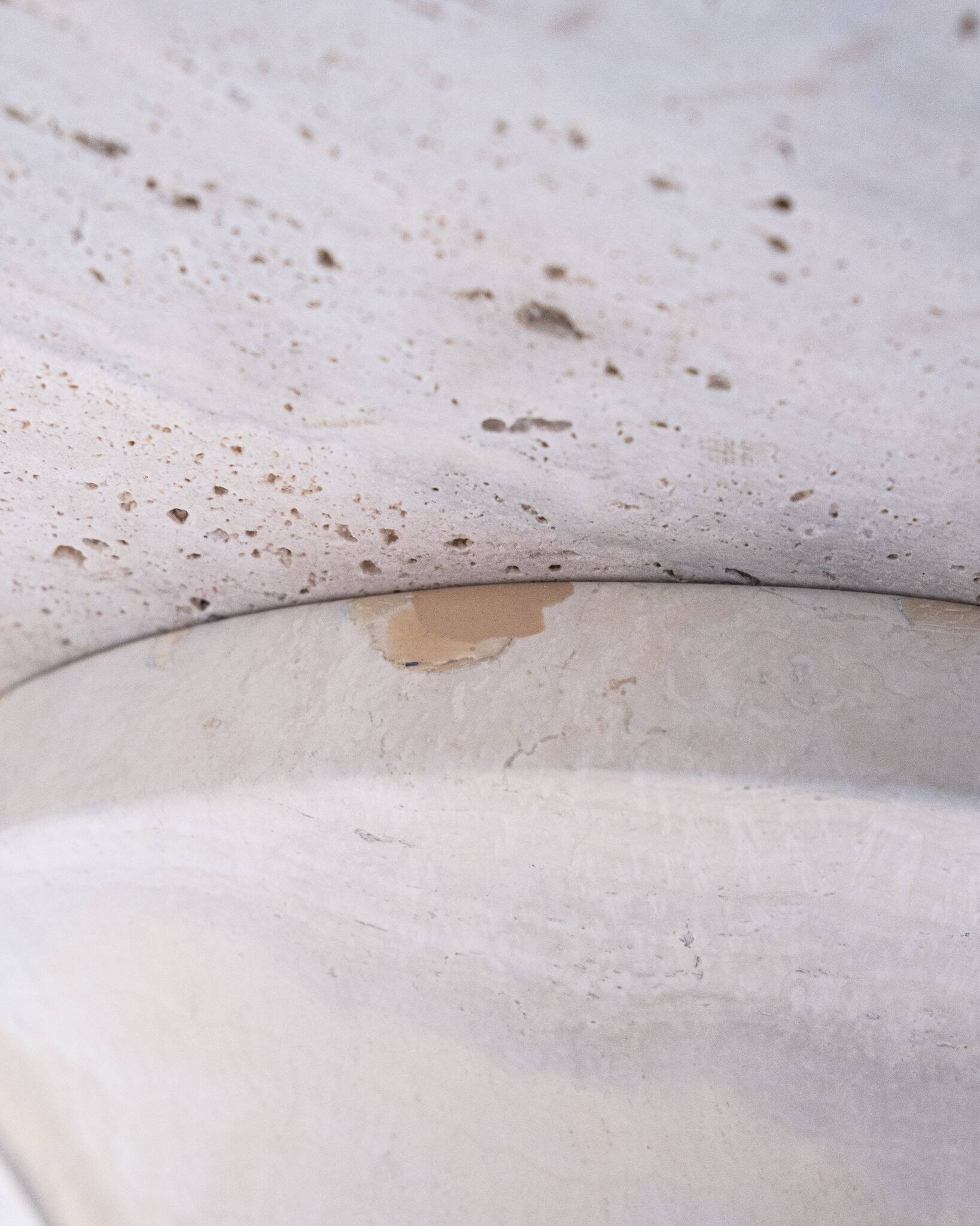 Pedestal dining table in travertine, Stone International, Italy, 1970s