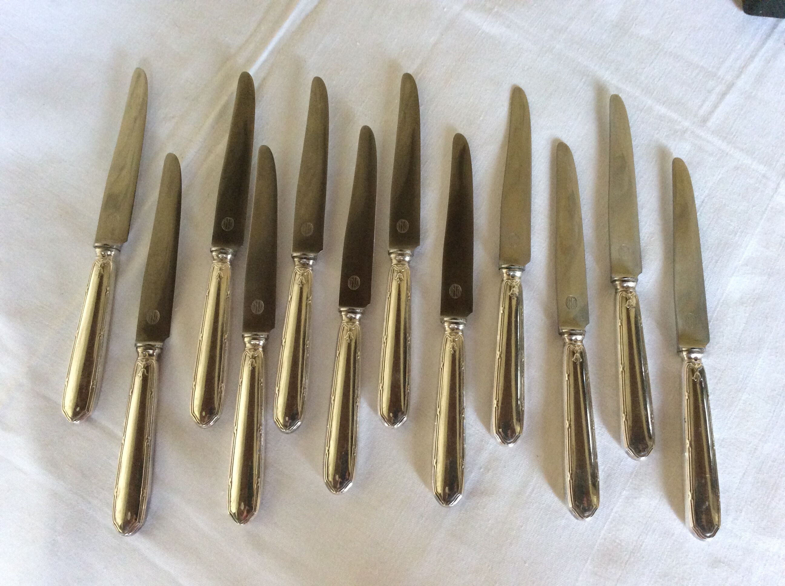 12 entremet knives, silver metal, cross ribbons